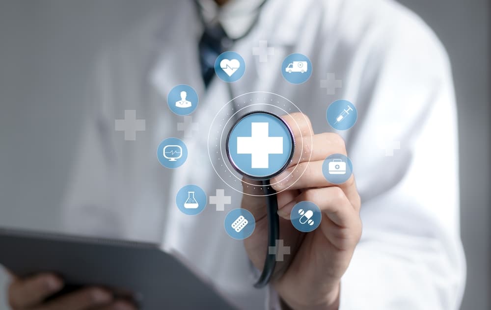 Health insurance concept. Doctor in a white coat uniform hand holding plus and healthcare medical icon, health and access to welfare health concept.