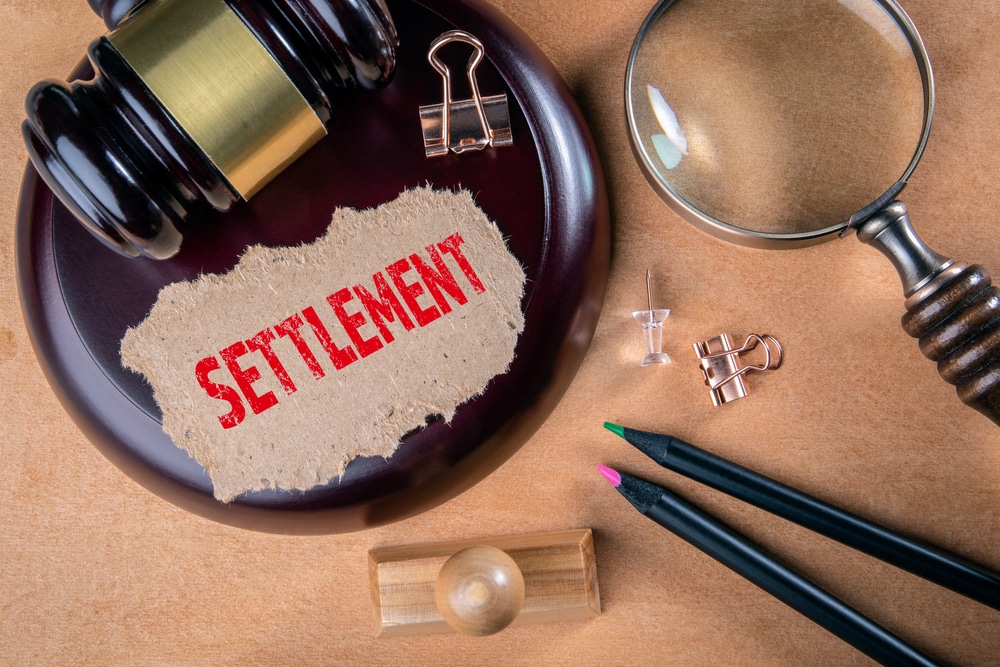 SETTLEMENT. Laws, litigation, lawyer and compromise concept.