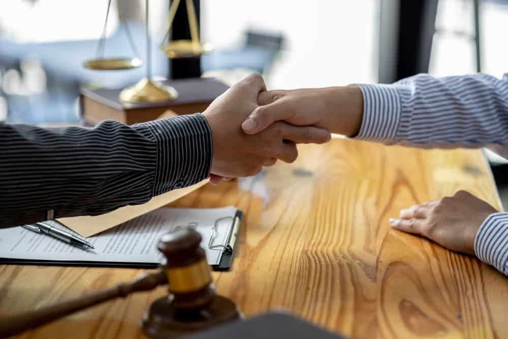 The concept of hiring a lawyer for legal proceedings.