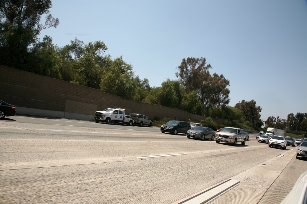 Oceanside car accident lawyer investigating freeway crash scenes to establish fault.
