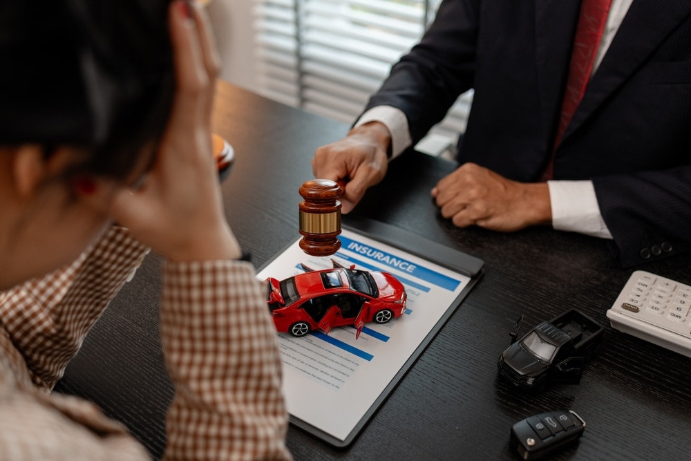 San Diego car accident lawyer advising a client on insurance claims and injury compensation after a vehicle accident.