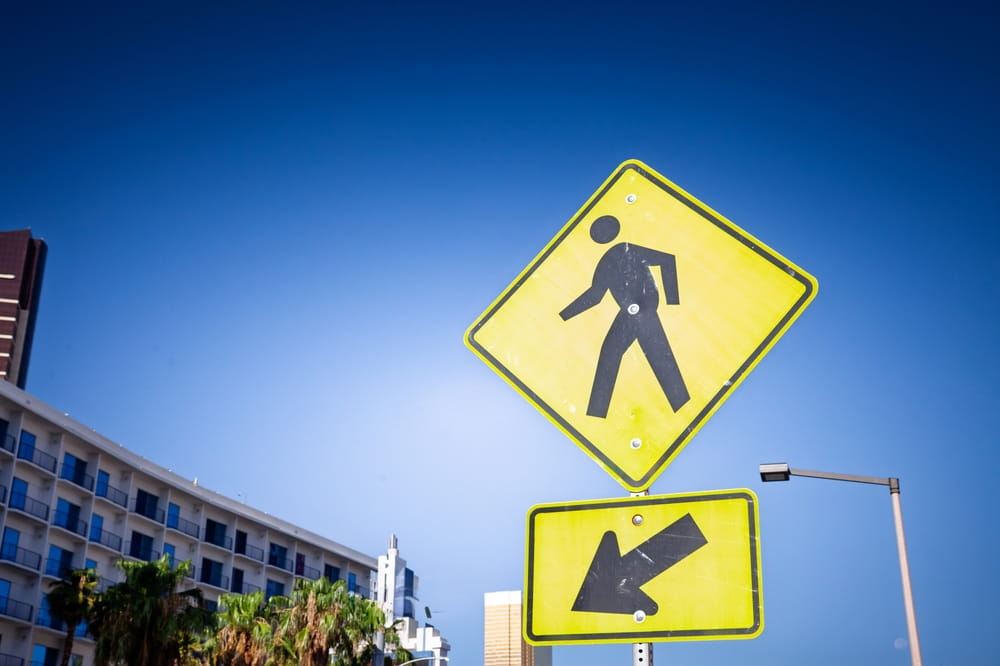 Pedestrian crossing warning sign near an intersection in Escondido California