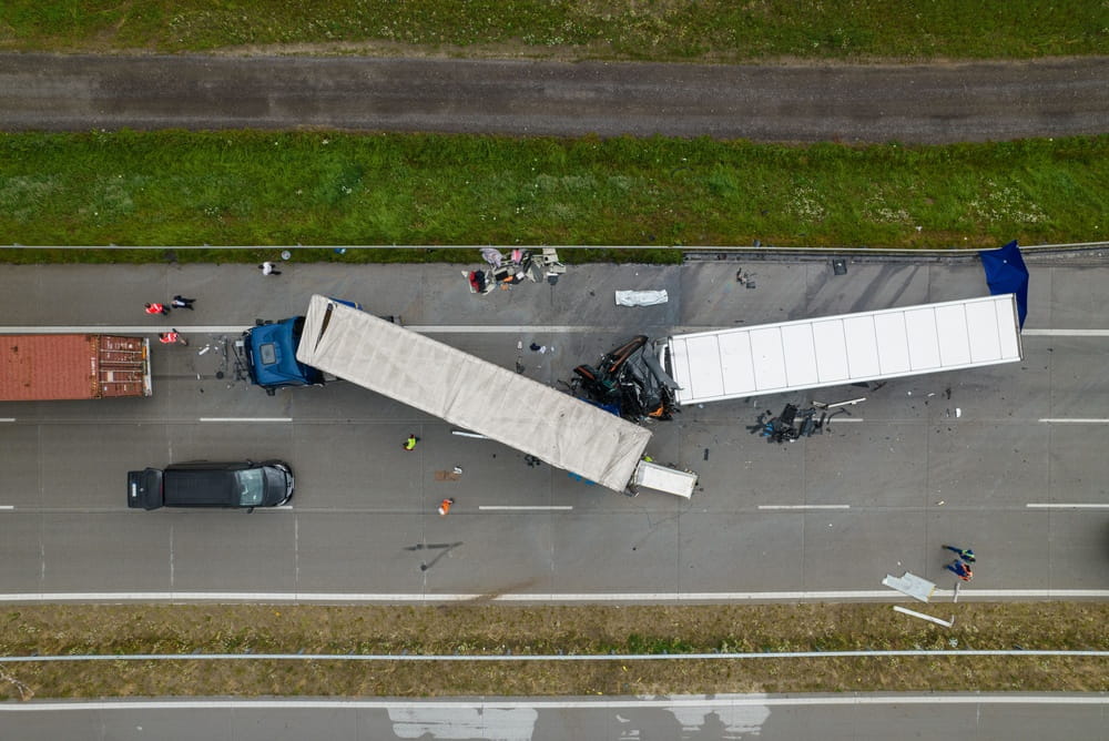 Aerial view of a major semi-truck crash on the Otay Mesa Freeway SR-905